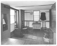 SA0524 - Exhibit at Fruitlands Museum, Harvard, Mass., showing No. 3 Shaker House: a long room facing south, a room with stove, chairs, desk, and tall chest; ., Winterthur Shaker Photograph and Post Card Collection 1851 to 1921c